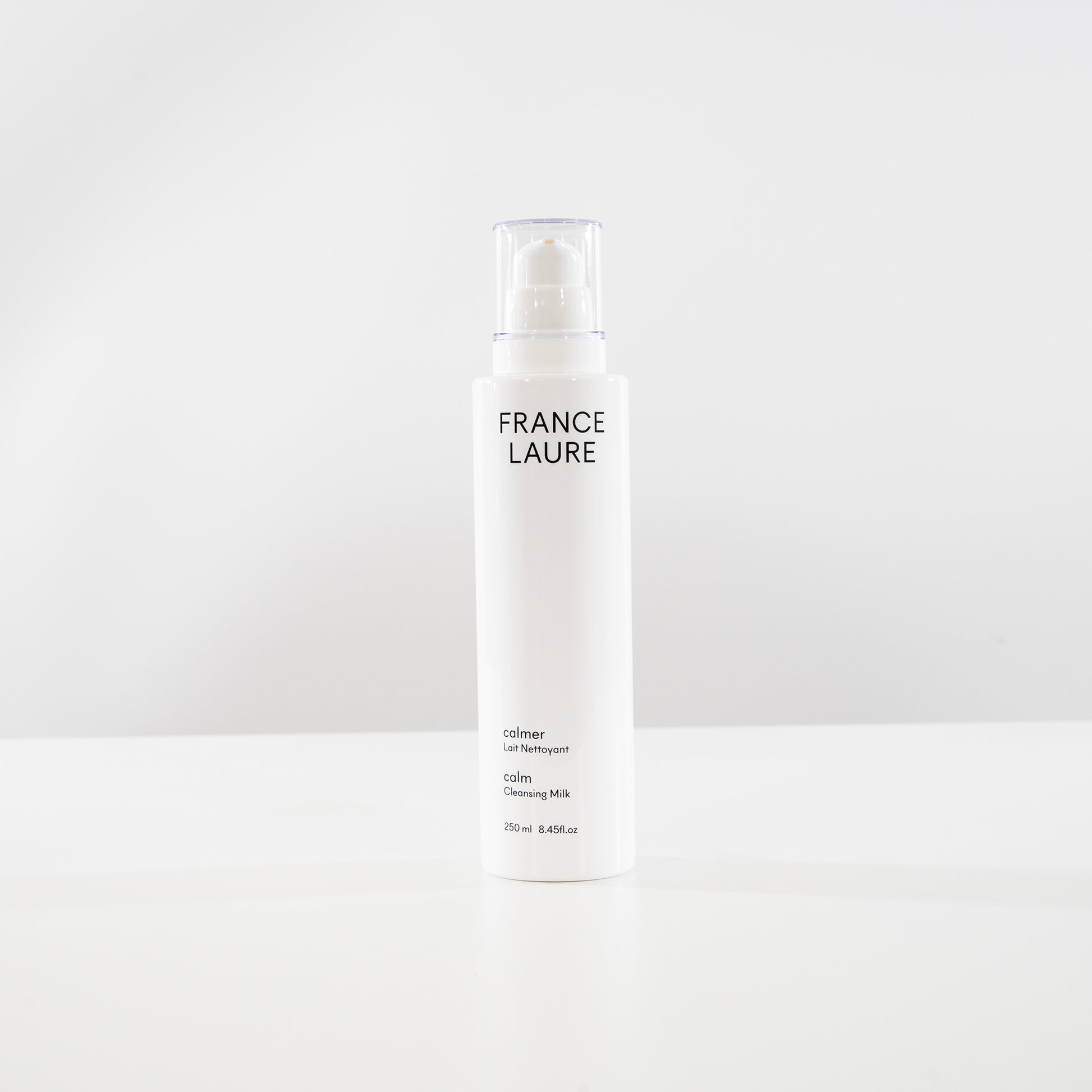 France Laure Calm Cleansing Milk 250ml — gentle face cleanser for all skin types in minimalist white bottle with pump dispenser