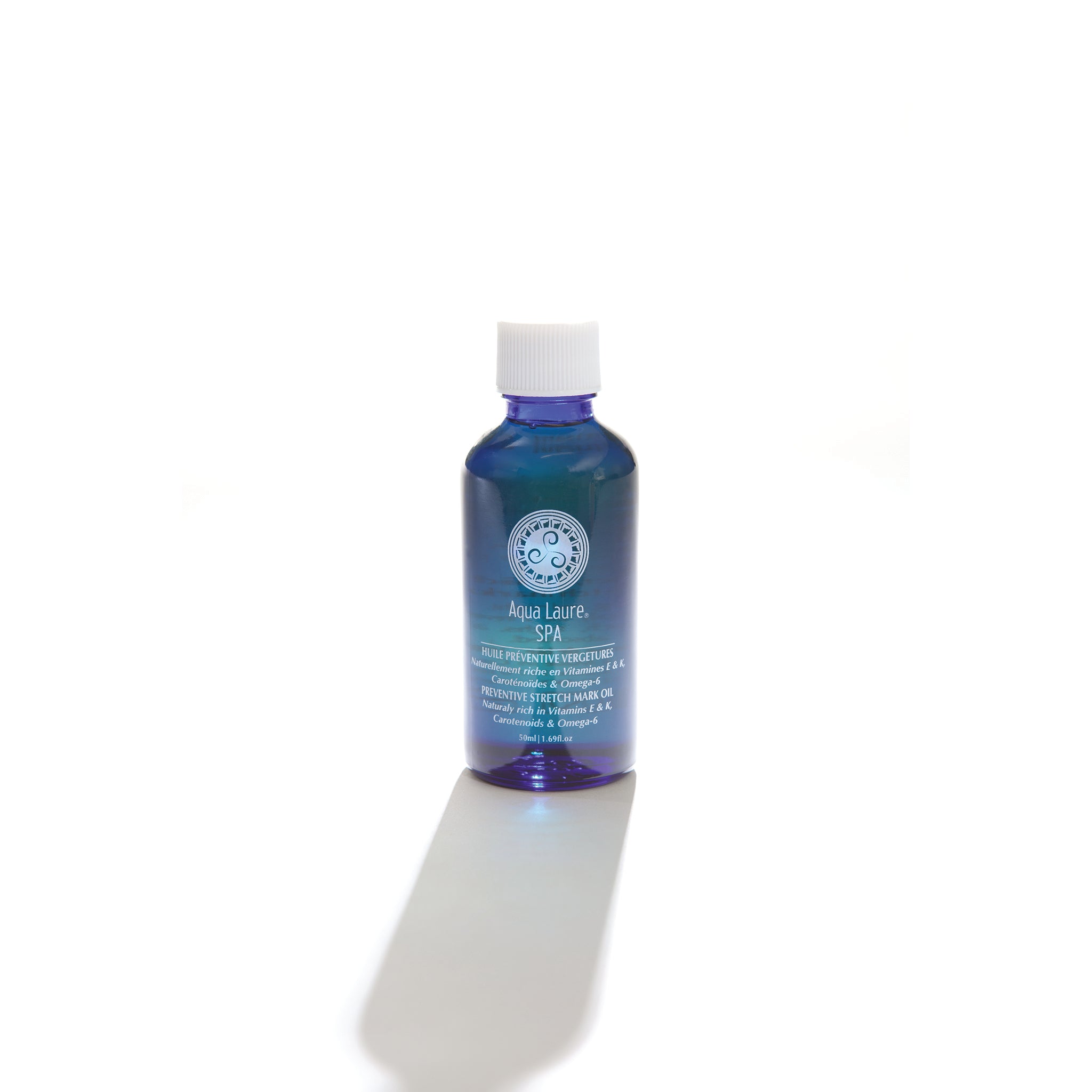 Aqua Laure SPA Preventive Stretch Mark Oil in blue bottle, rich in Vitamins E & K, Carotenoids & Omega-6 for skin care